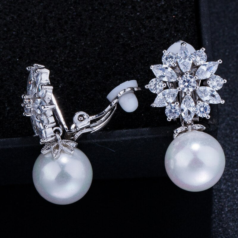 SUNNEE CRYSTAL AND SIMULATED PEARL CLIP ON EARRINGS