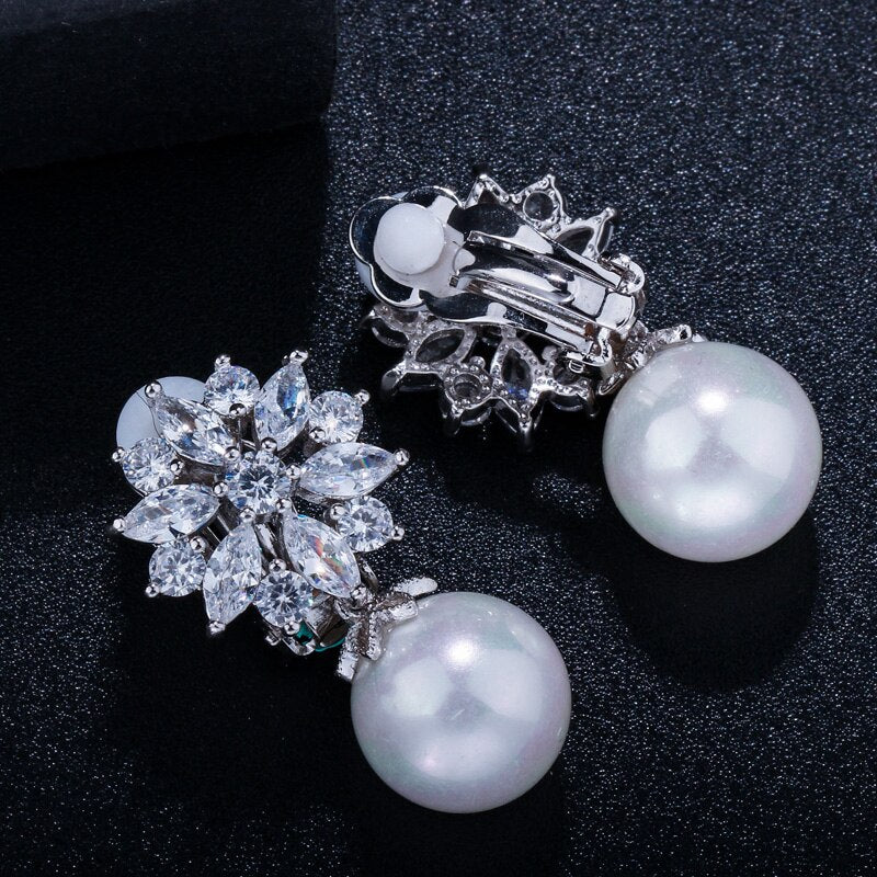 SUNNEE CRYSTAL AND SIMULATED PEARL CLIP ON EARRINGS