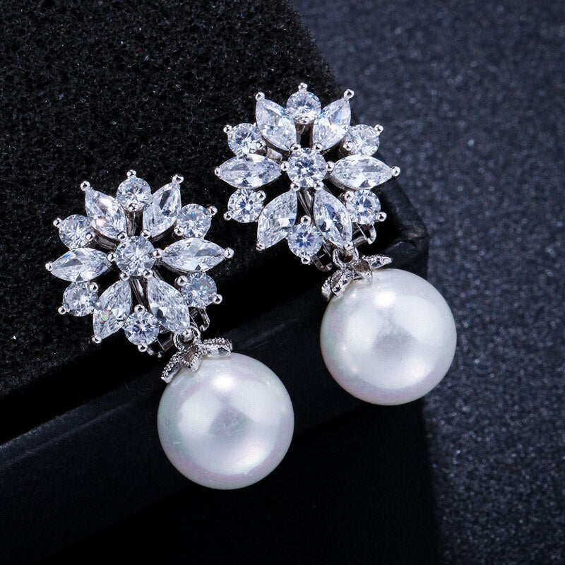SUNNEE CRYSTAL AND SIMULATED PEARL CLIP ON EARRINGS