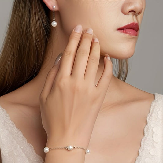 AVA SHELL PEARL AND PLATINUM PLATED EARRING AND BRACELET SET
