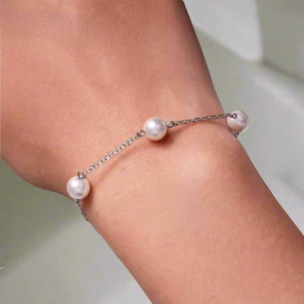 AVA SHELL PEARL AND PLATINUM PLATED EARRING AND BRACELET SET