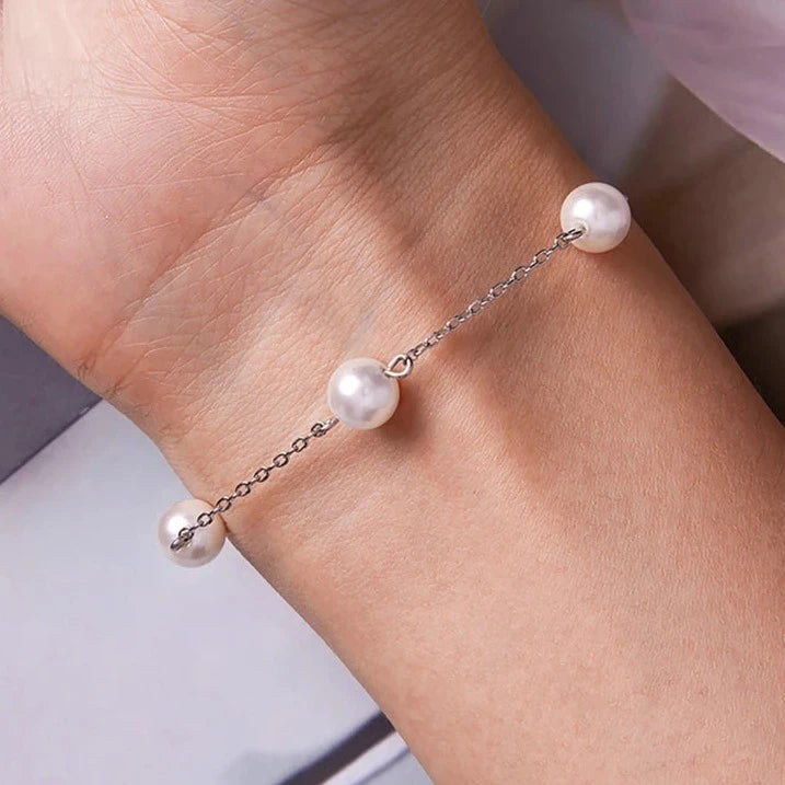 AVA SHELL PEARL AND PLATINUM PLATED EARRING AND BRACELET SET